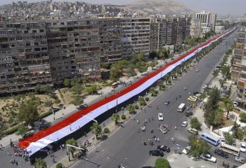 Vlajka podpory Asadovi v roku 2011
