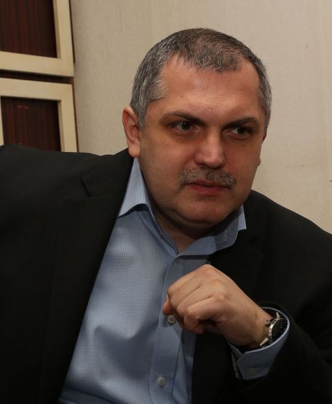 Na snímke politológ Roman Michelko