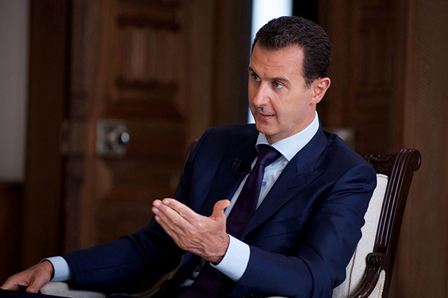 Na snímke zverejnenej Sýrskou oficiálnou tlačovou agentúrou SANÁ sýrsky prezident Bašár Asad.