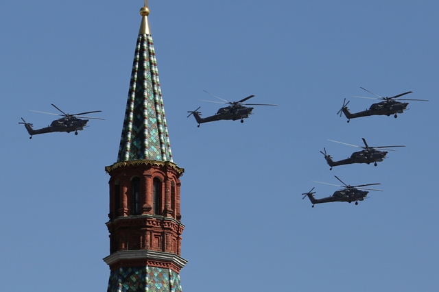 Na ilustračnej snímke ruské moderné útočné vrtuľníky Mil Mi-28 Foto:TASR/AP-Denis Tyrin