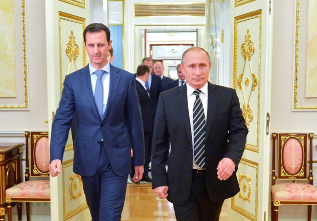Na snímke sýrsky prezident Bašár Asad (vľavo) a ruský prezident Vladimir Putin Foto:TASR-Alexei Druzhinin, RIA-Novosti, Kremlin Pool Photo via AP